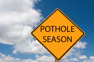 pothole season sign