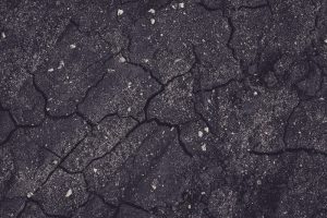 A cracked section of asphalt 