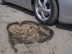 repair winter potholes as soon as possible