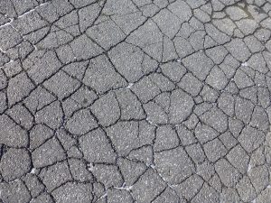 Learn what to do when the asphalt in your parking lot is wearing down.